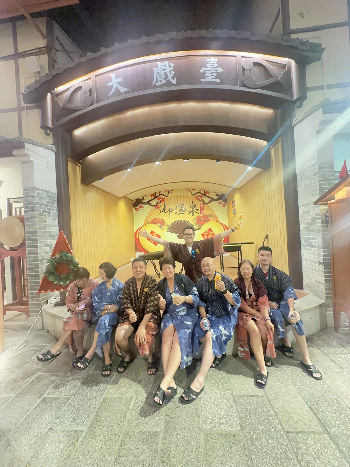 Travellers posing together during a tour