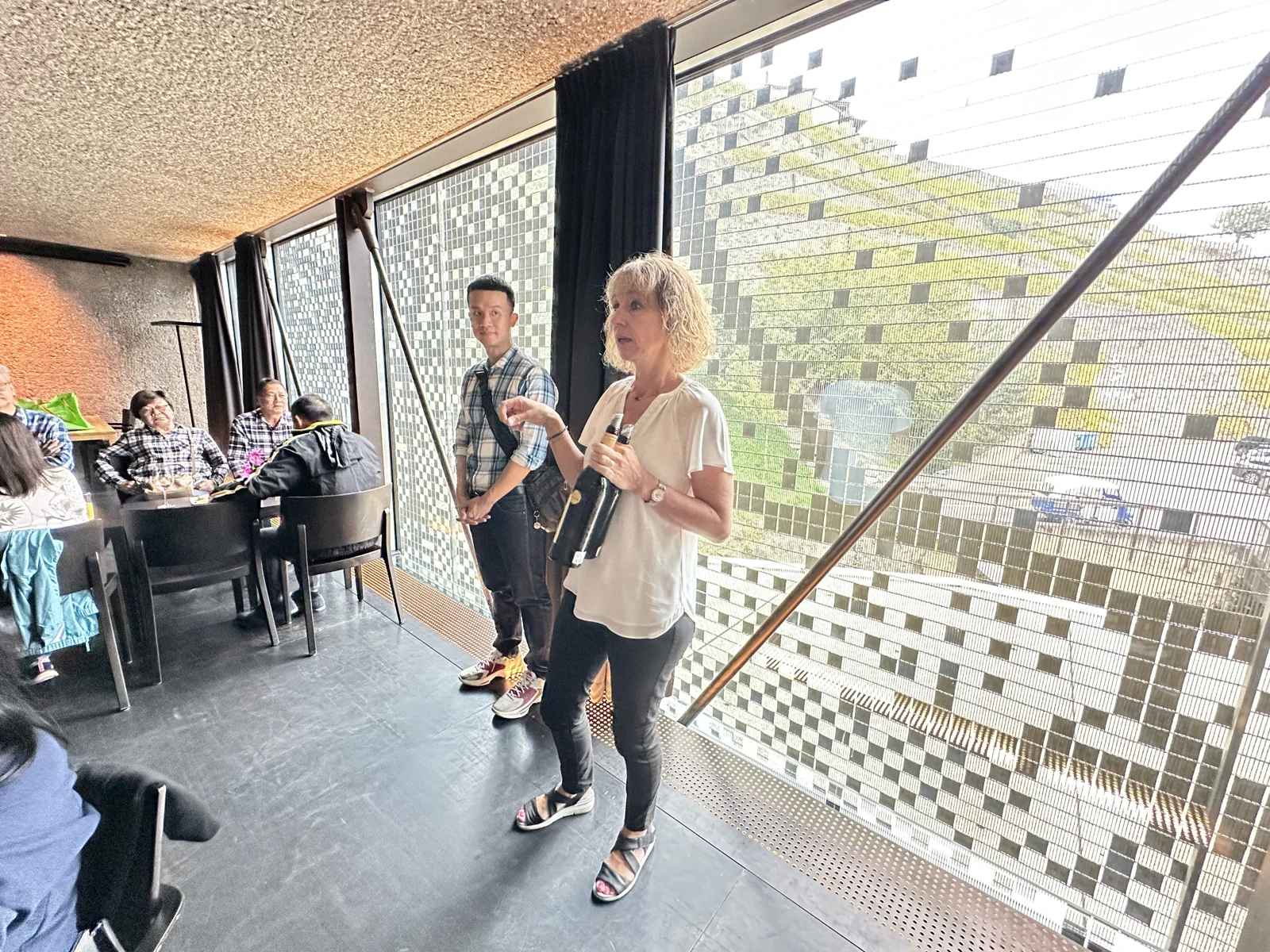 Travellers sharing a winery visit in Switzerland