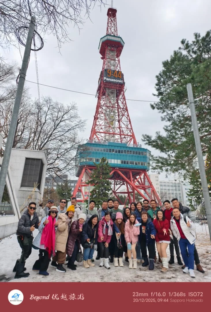 Our travel group in front of Tokyo Tower