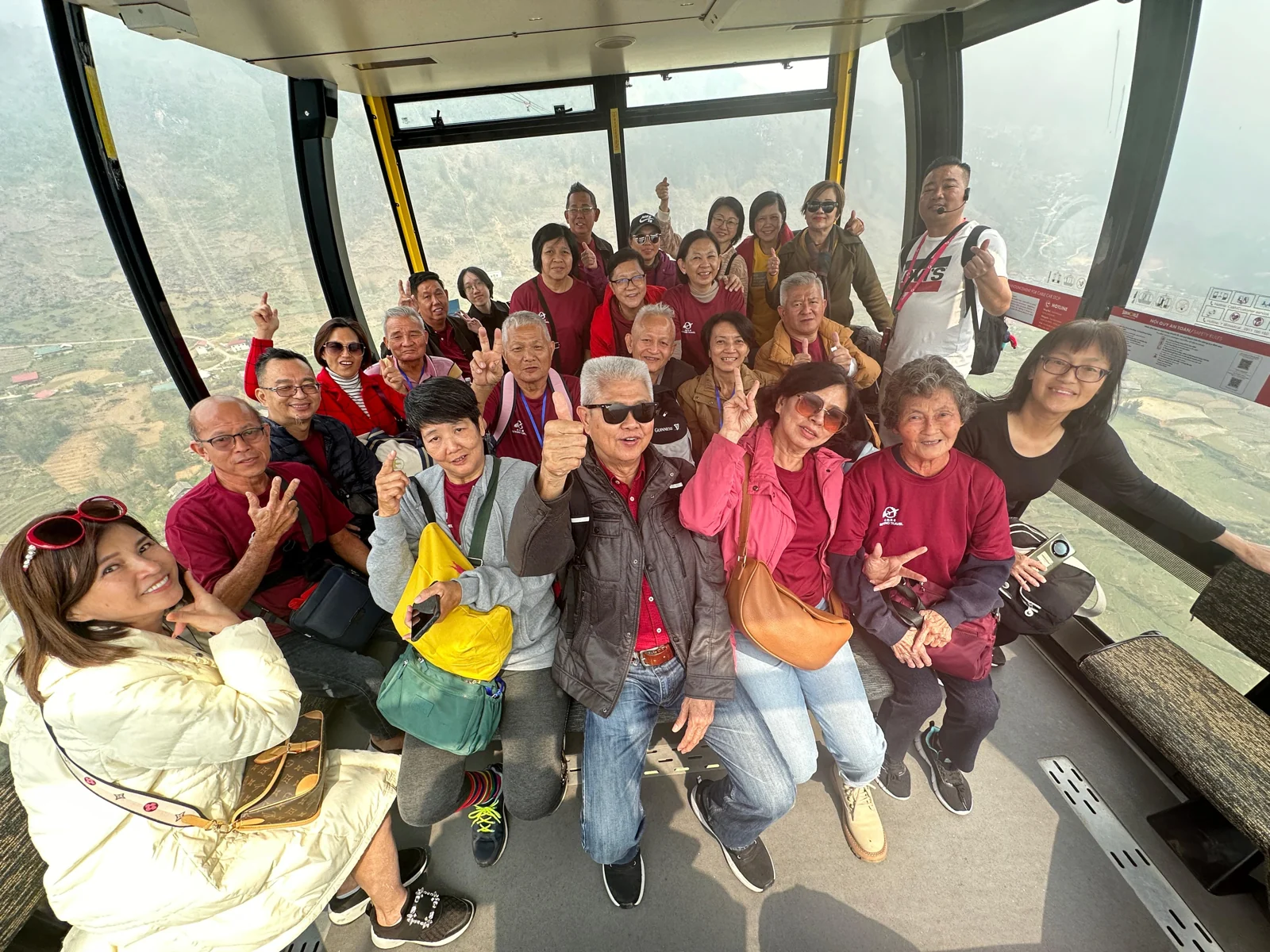 Travellers posing inside a sightseeing carriage