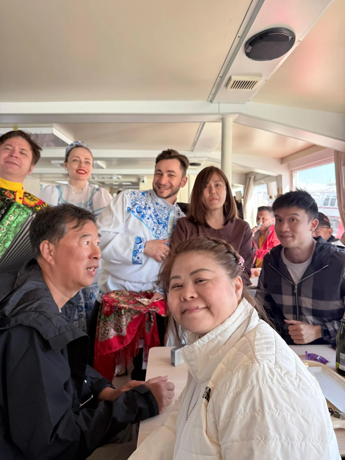 Our travel group gathered on a boat in Russia